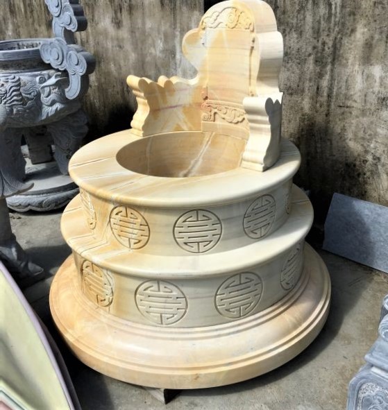 Mẫu mộ tròn bằng đá vàng Nghệ An